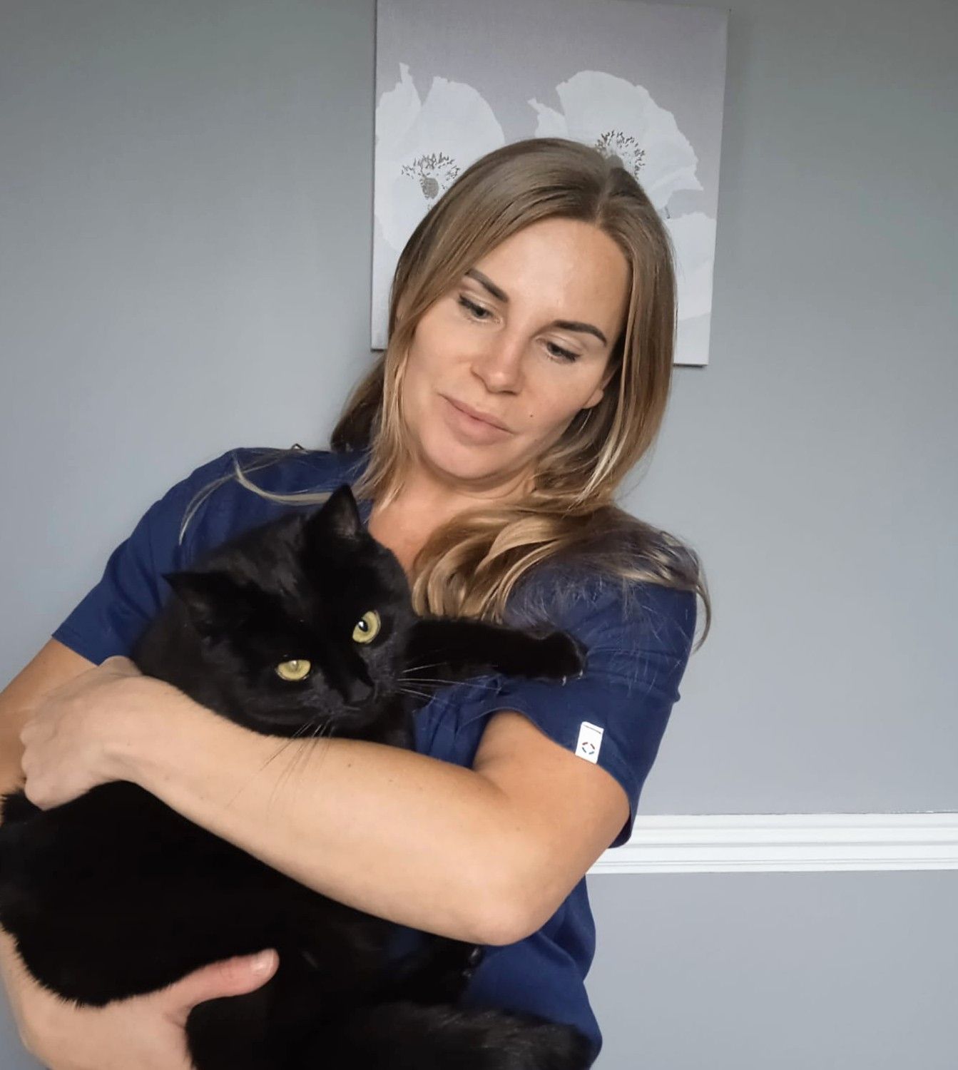 Celia Carr with a black cat